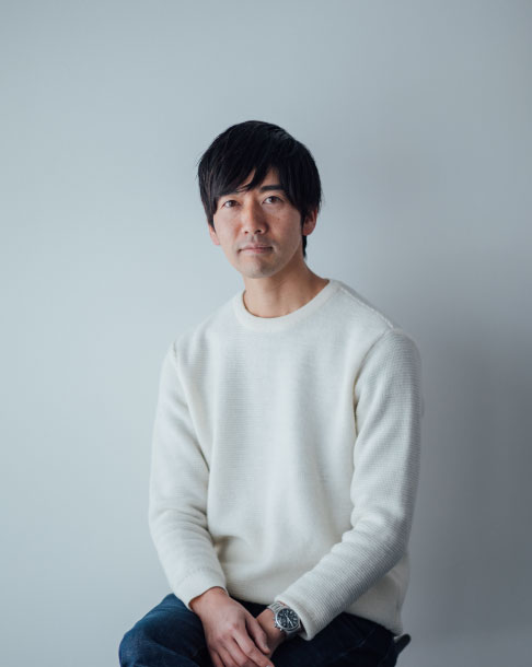 津田 賀央